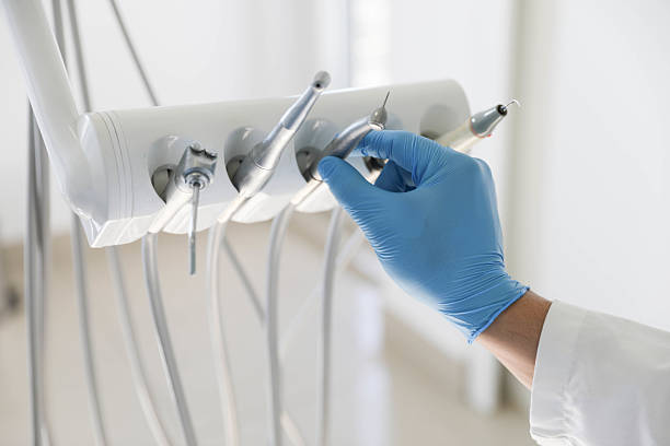 Professional Tooth Extraction technician working in Dulles Town Center, VA